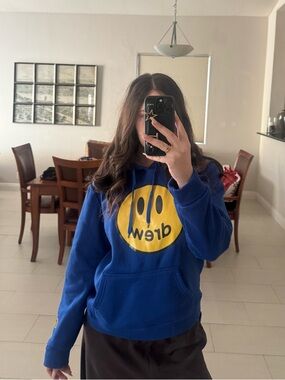 drew house blue hoodie with yellow smiley logo